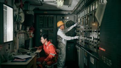 Seafarers operate internal ship mechanisms